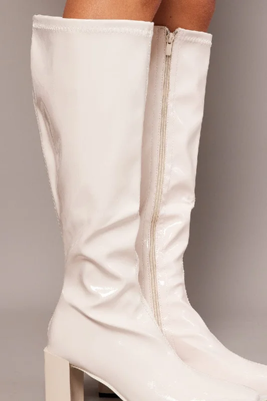 White Knee High Boots in Patent